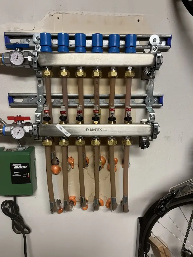 Plumber performing Water Heater Repair at a residential property in Grafton